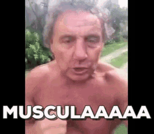 a shirtless man is making a funny face and says `` musculaaa '' in a video .