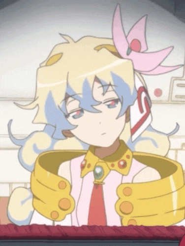 a girl with a flower in her hair is wearing a pink and yellow outfit