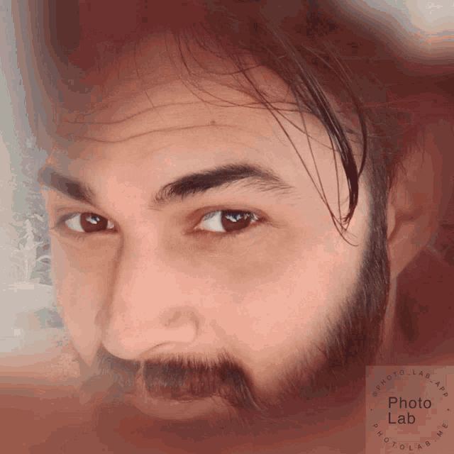 a man with a beard and a photo lab logo