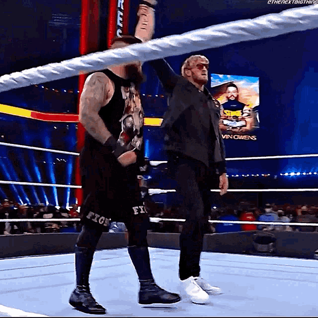 Logan Paul Kevin Owens GIF