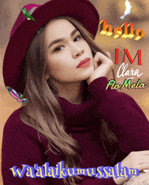 a woman wearing a red hat and a purple sweater says hello