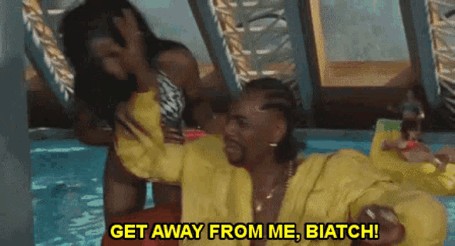 a man in a yellow robe is being held by a woman in a bikini and the words get away from me biatch are above him