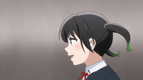 a girl with a ponytail is wearing headphones