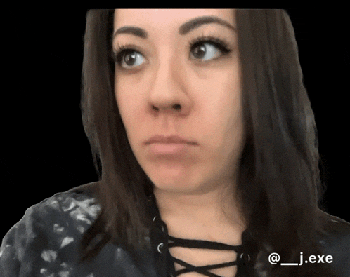 a close up of a woman 's face with the hashtag @_j_exe