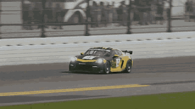 a yellow race car with the number 17 on the front