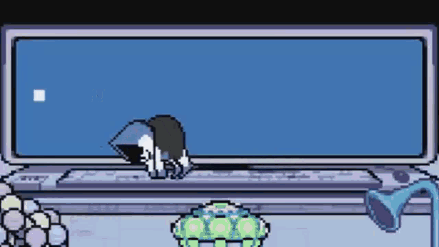 a pixel art drawing of a person sitting in front of a computer .