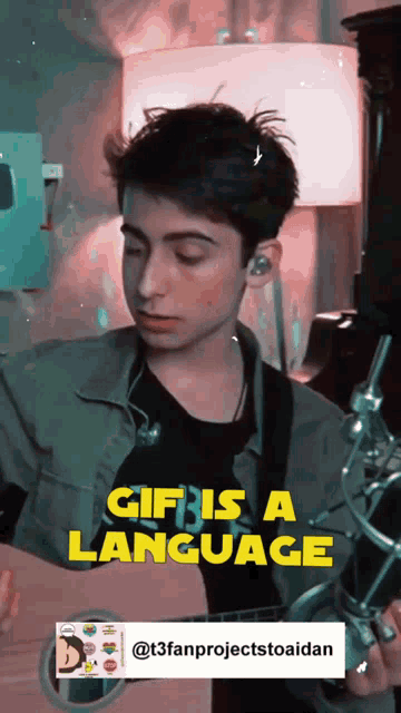a gif of a young man playing a guitar with the words gif is a language above him