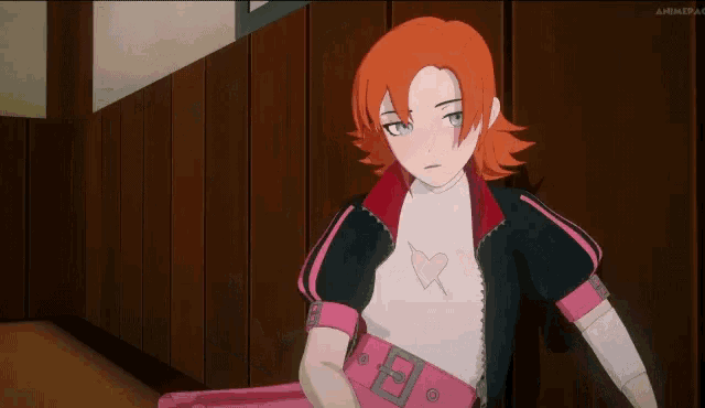 a cartoon girl with red hair and a heart on her shirt