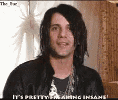 a man with long hair and a black jacket says it 's pretty freaking insane .