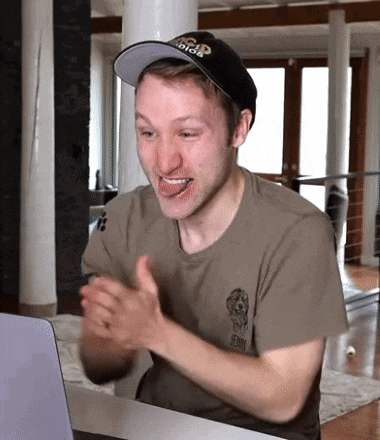a man wearing a hat and a t-shirt that says jenny on it