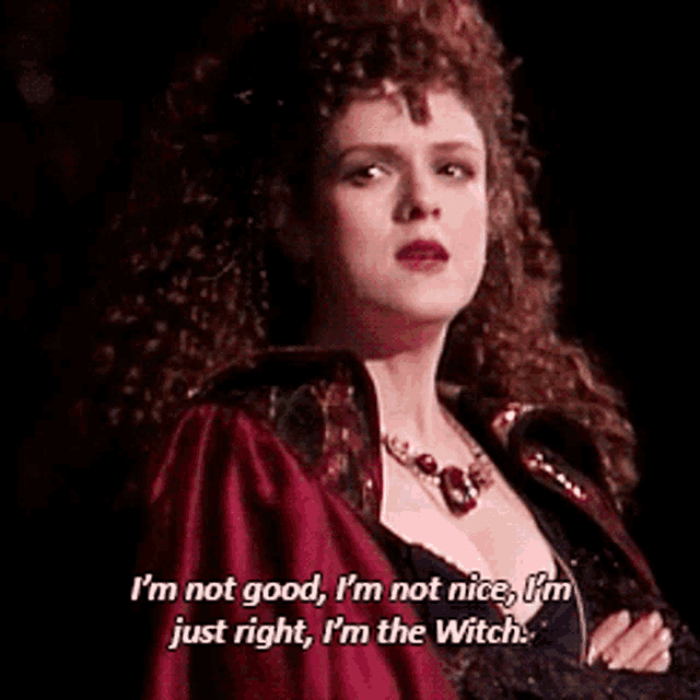 a woman with curly hair is singing and says i 'm not good