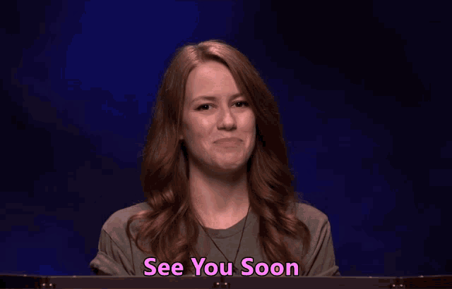 a woman says see you soon in a video