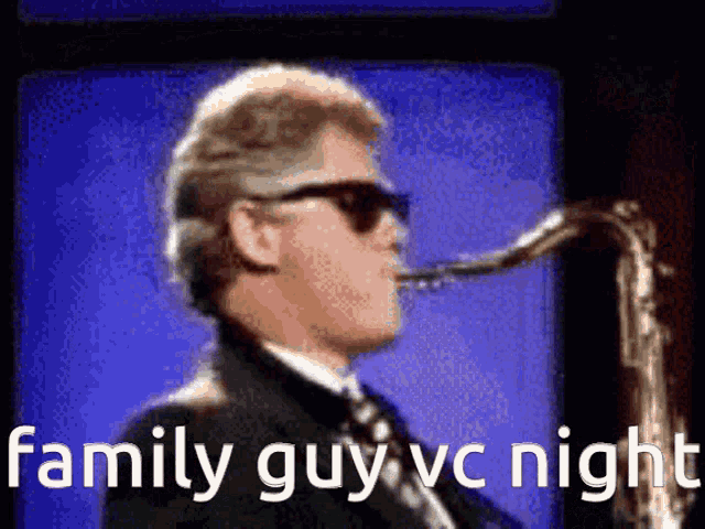 a man in a suit and tie is playing a saxophone with the words family guy vc night below him