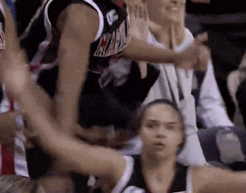 a basketball player wearing a jersey with the word miami on it