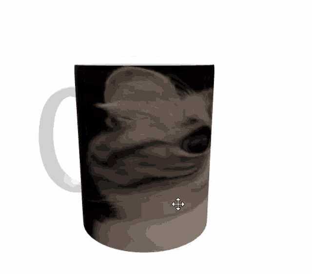 a coffee mug with a picture of a cat and a cross on it