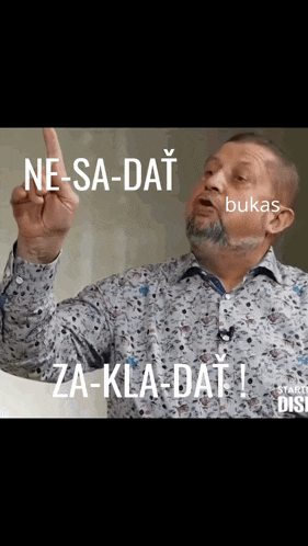 a man with a beard is pointing up and says ne-sa-dat bukas za-kla-dat