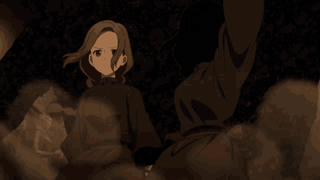 a couple of anime characters standing next to each other with their arms in the air