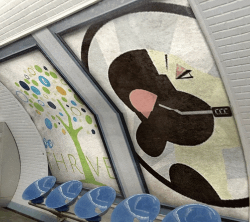 a painting of a penguin with the word thrive on it