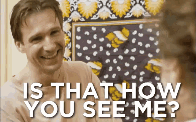 a man is smiling with the words " is that how you see me " behind him