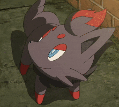 a black and red cartoon animal with blue eyes