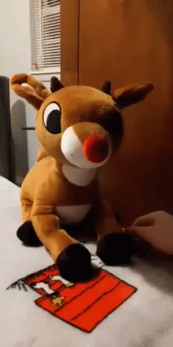 Rudolph Pet GIF - Rudolph Pet Cute Reindeer GIFs