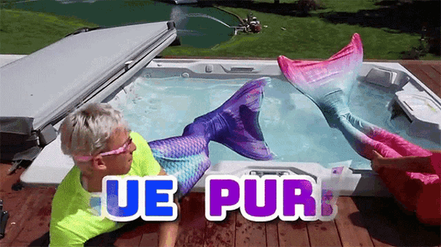 two mermaids are in a hot tub with the words ue pur written on the bottom