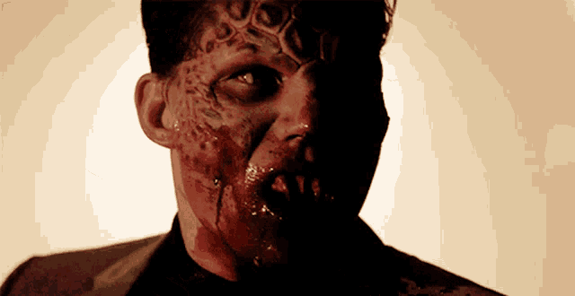 a man with blood coming out of his mouth