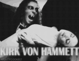 a black and white photo of a vampire and a woman with kirk von hammett written in white