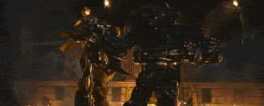 a person is standing in a room with a blue light coming out of them .