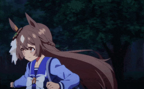 a girl with long brown hair is wearing a blue sailor suit