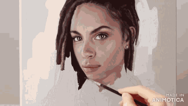 a person is painting a woman 's face with a brush and the words made in animatica are visible