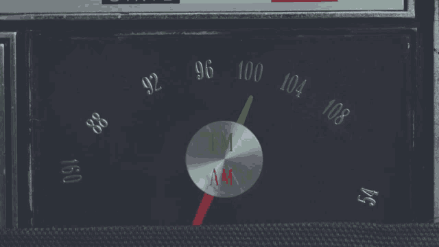 a close up of a fm am radio with the numbers 96 through 108