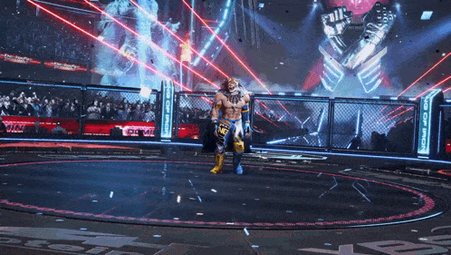 a wrestler in a ring with a sign behind him that says ' ioomi '