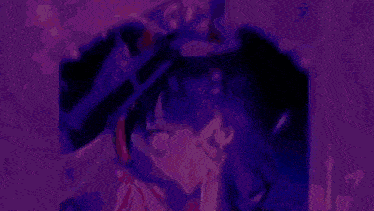 a purple and blue background with a person 's face in the middle