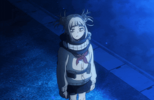 a girl with pigtails and a scarf around her neck is standing in the dark