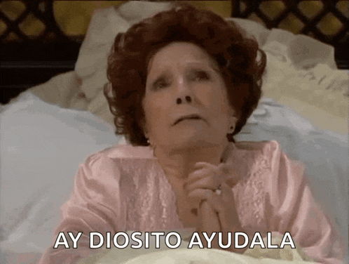 a woman laying in bed with the words ay diosito ayudala written on the bottom