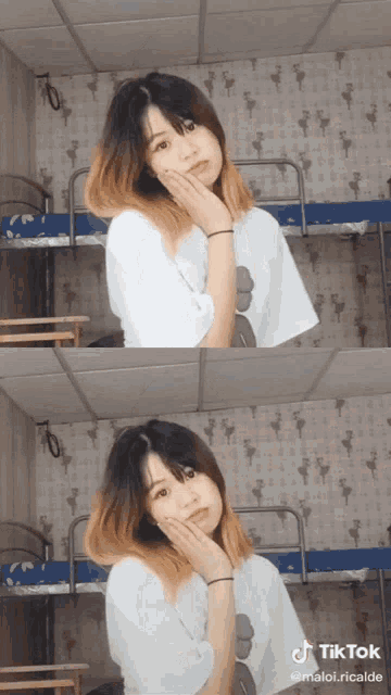 a tiktok video of a girl in a white shirt