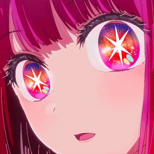 a close up of a person 's eyes with a star in the middle