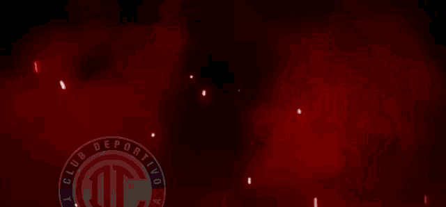 a red background with the words somos el toluca