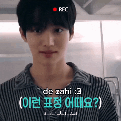 a young man is being recorded with a red rec button above him
