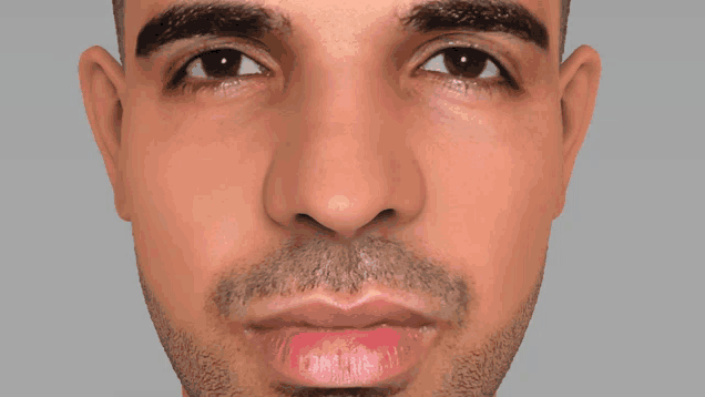 a close up of a man 's face with his eyes closed