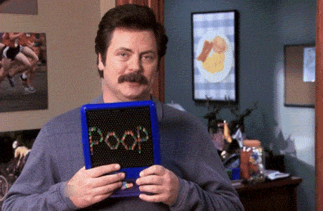 a man with a mustache is holding a blue box with the word poop written on it .