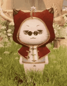a cartoon cat wearing a red hood and sunglasses is standing in the grass .