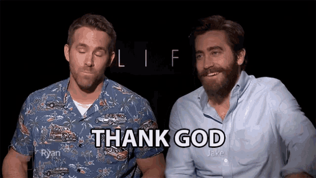 two men are sitting next to each other and one of them is saying thank god