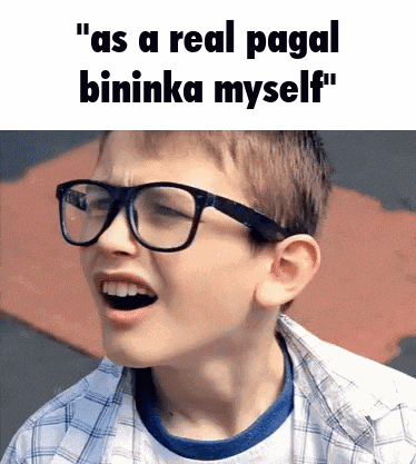 a young boy wearing glasses is making a funny face and the caption says " as a real pagal bininka myself "