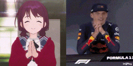 a man and a woman are sitting next to each other in front of a screen .