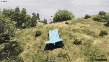 a video game screen shows a blue car going up a hill