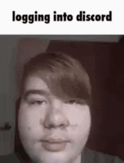 a close up of a person 's face with the words `` logging into discord '' above it .
