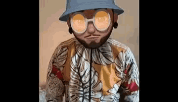 a man wearing a hat , glasses and a hawaiian shirt is making a cartoon face .