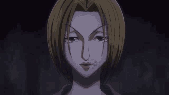 a close up of a cartoon character 's face with blood on her face